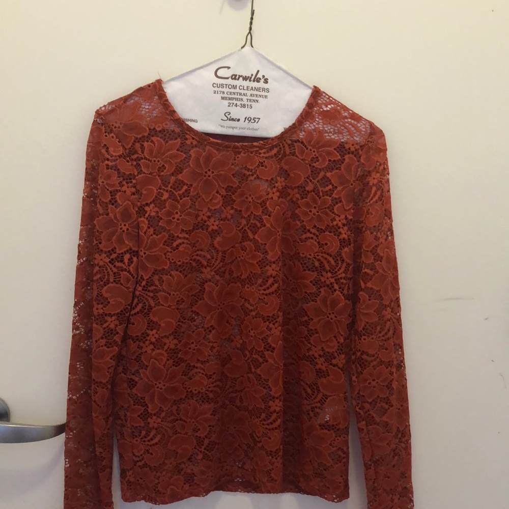 orange hollister shirt with flower details